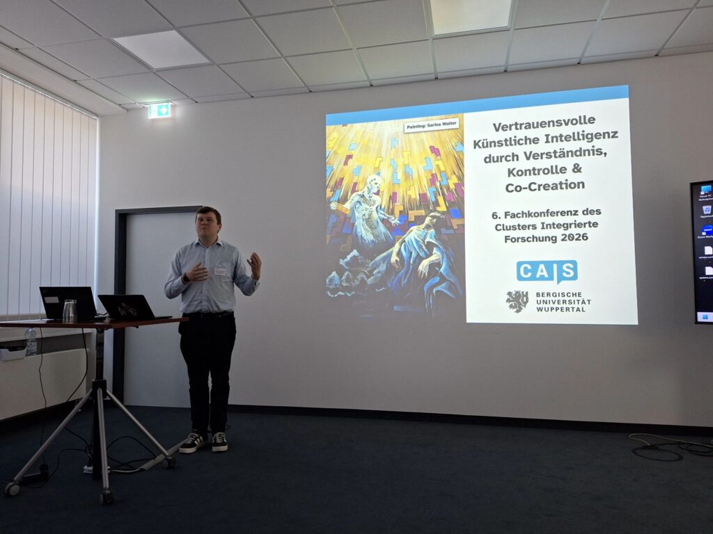 Das Bild zeigt Vortragenden, Prof. Dr. Hendrik Heuer, während seines Vortrags.